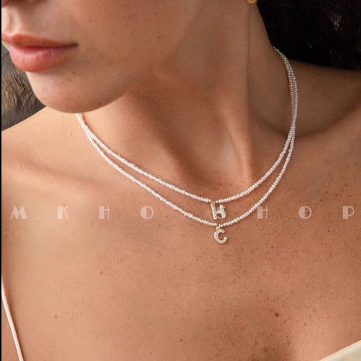 THE MINI PEARL NAME NECKLACE